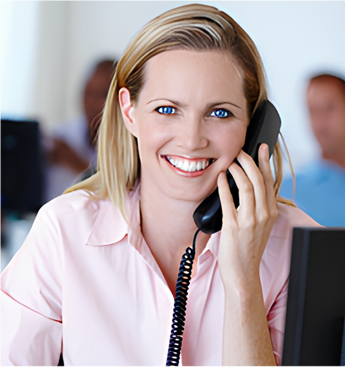 A woman holding a phone to her ear.